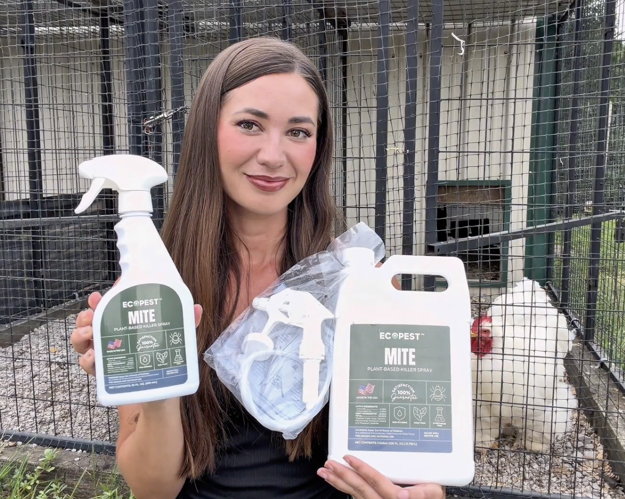 EcoPest Mite Killer Spray 22 oz and 1-gallon bottles held in front of a backyard chicken coop